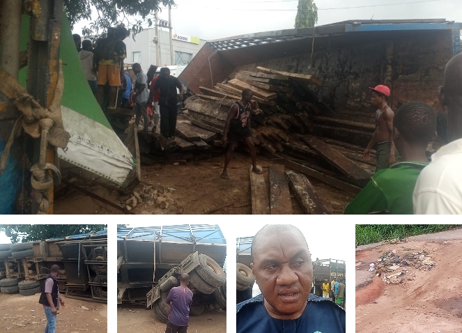 Tragedy Averted as Timber-Laden Trailer Crashes in Umuahia Market